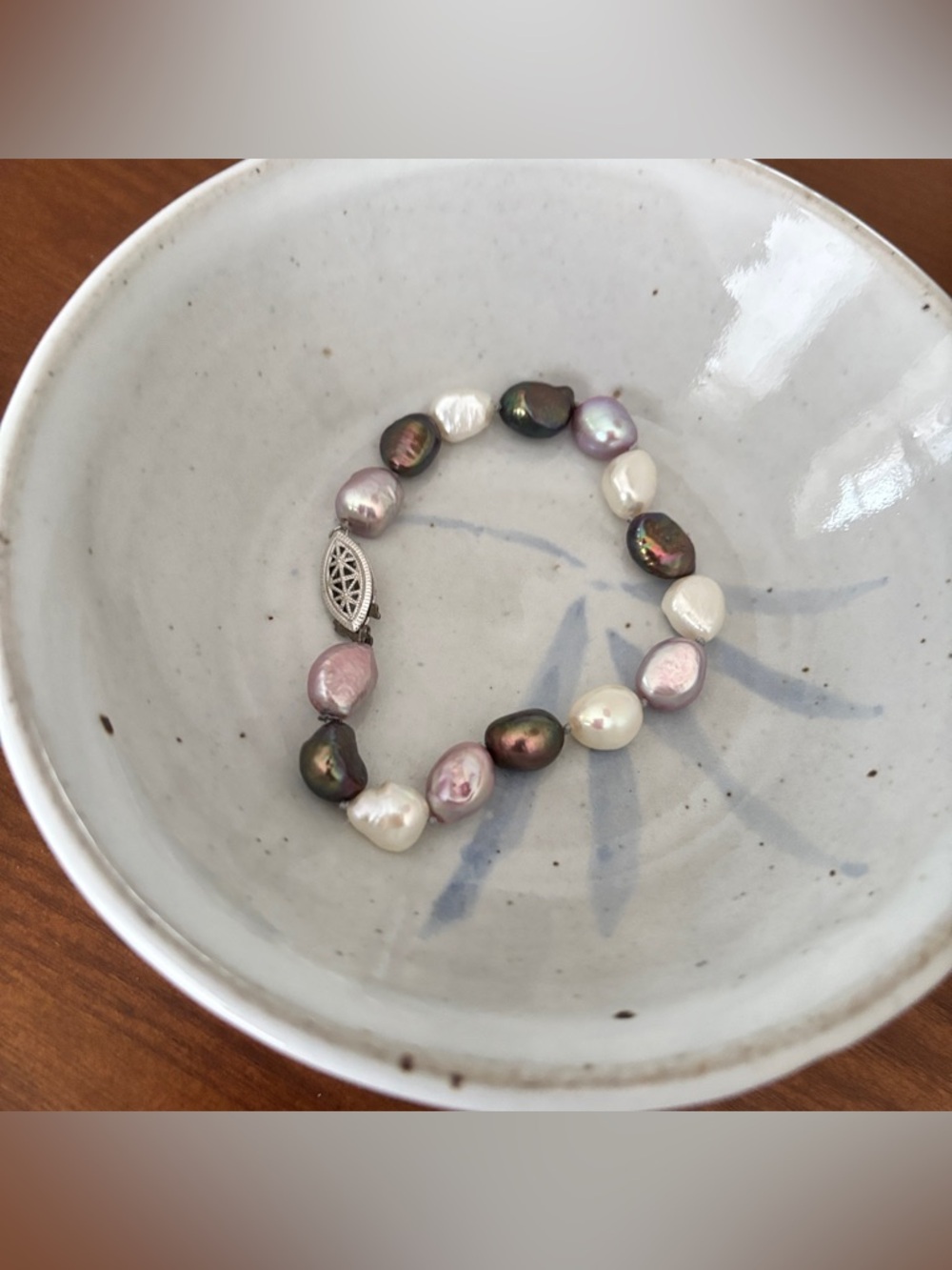 Freshwater pearl bracelet with ornate silver clasp